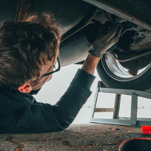 Technician performing an oil service